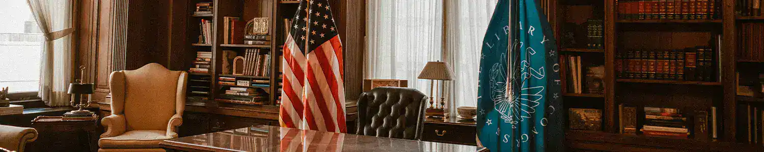 Historic 365 office interior featuring American flags and vintage decor.